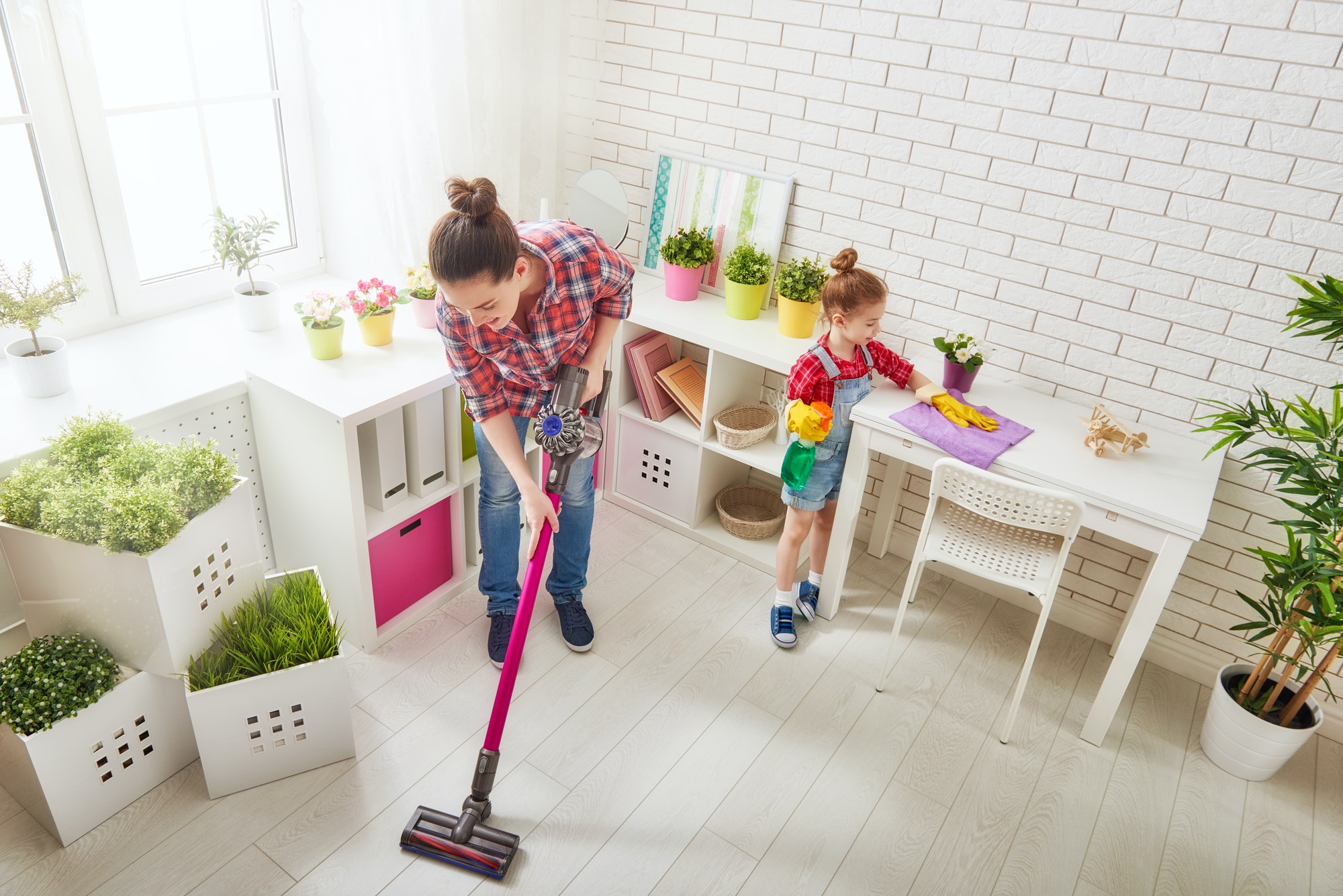 family cleans the room