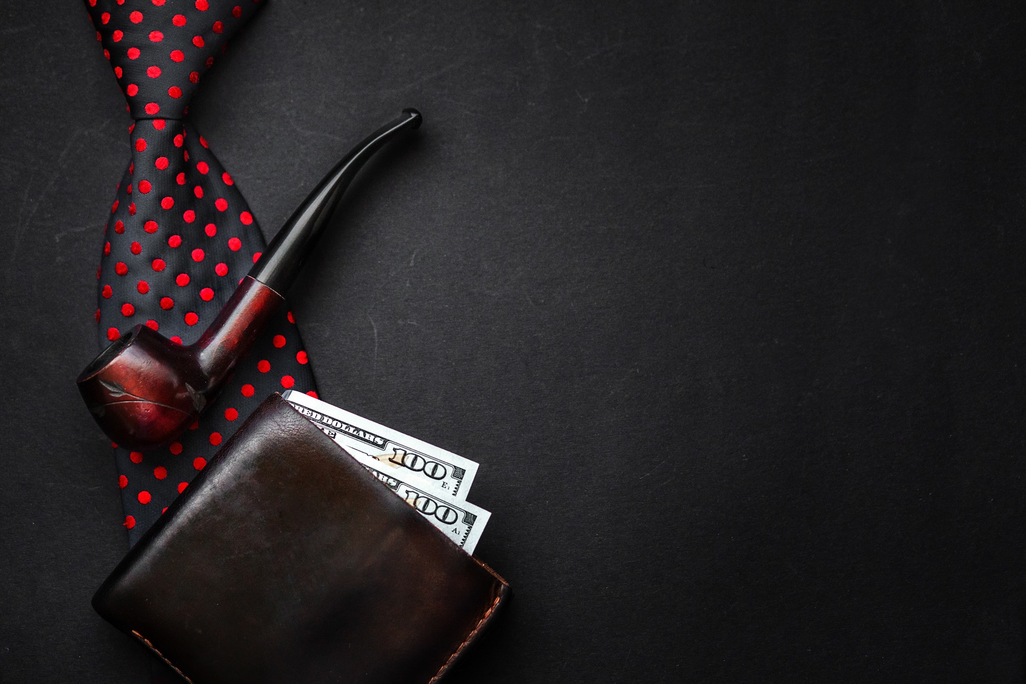 Bow tie leather wallet with money wooden tobacco pipe